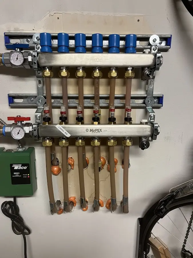 Plumber performing Water Heater Repair at a residential property in Weaverville